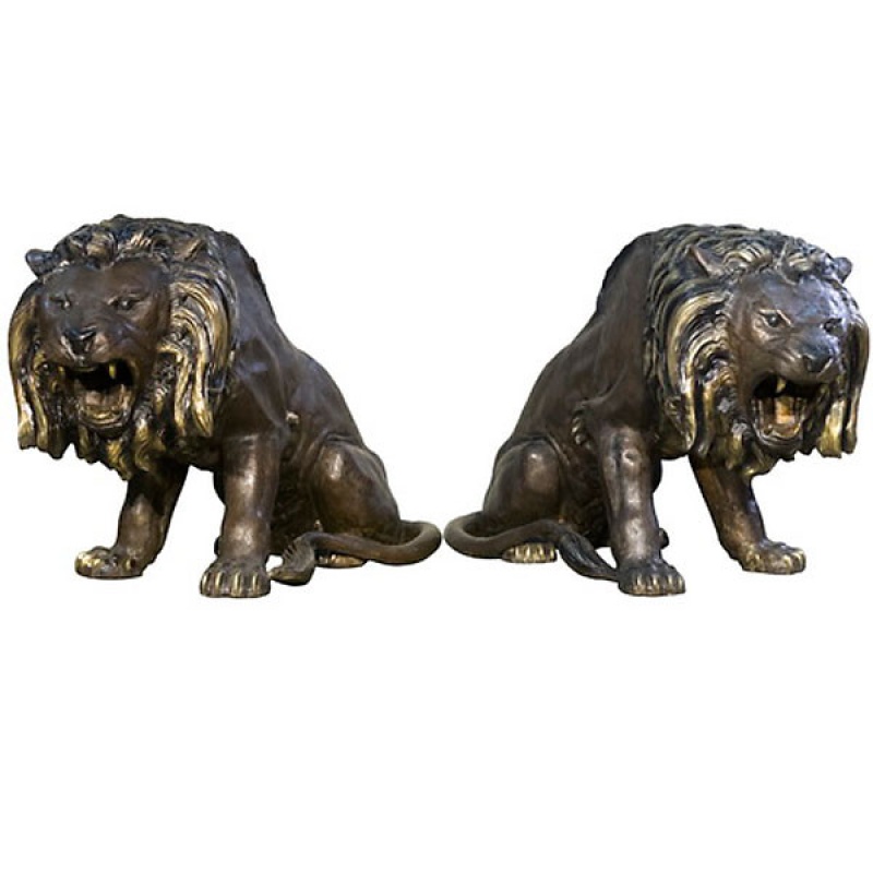 Pair Of Sitting Lions Facing Right And Left