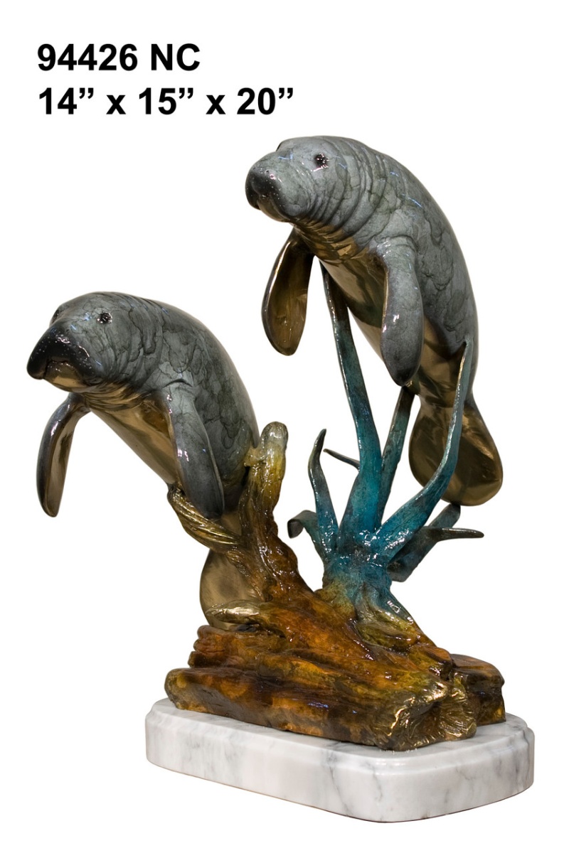 Two Manatees On Marble Base