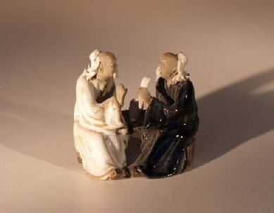 Ceramic Figurine Two Men Sitting On A Bench - 2.5" Color: White & Blue