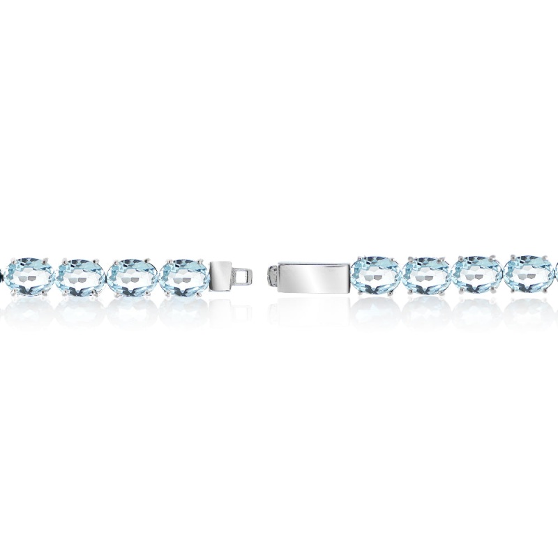 Sterling Silver 19.35Ct Blue Topaz 7X5mm Oval Tennis Bracelet
