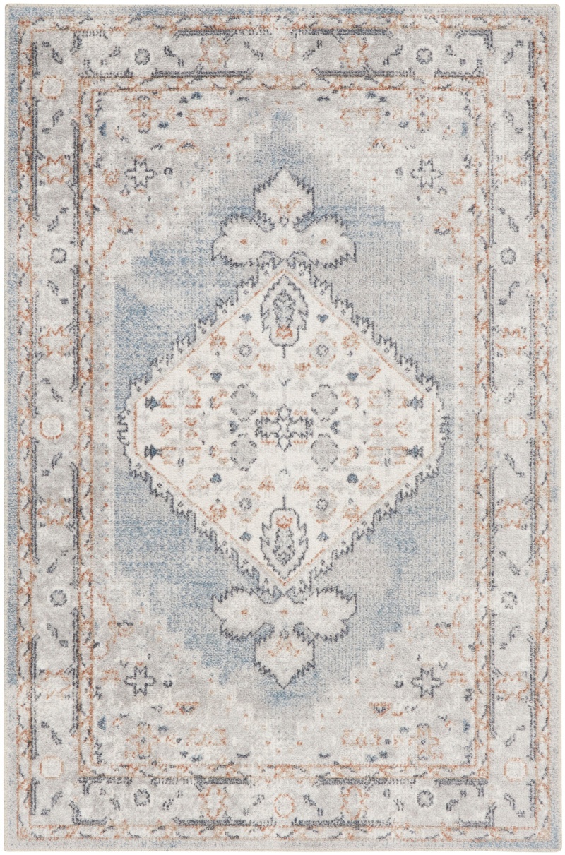 Astra Machine Washable Light Blue Vintage Area Rug
